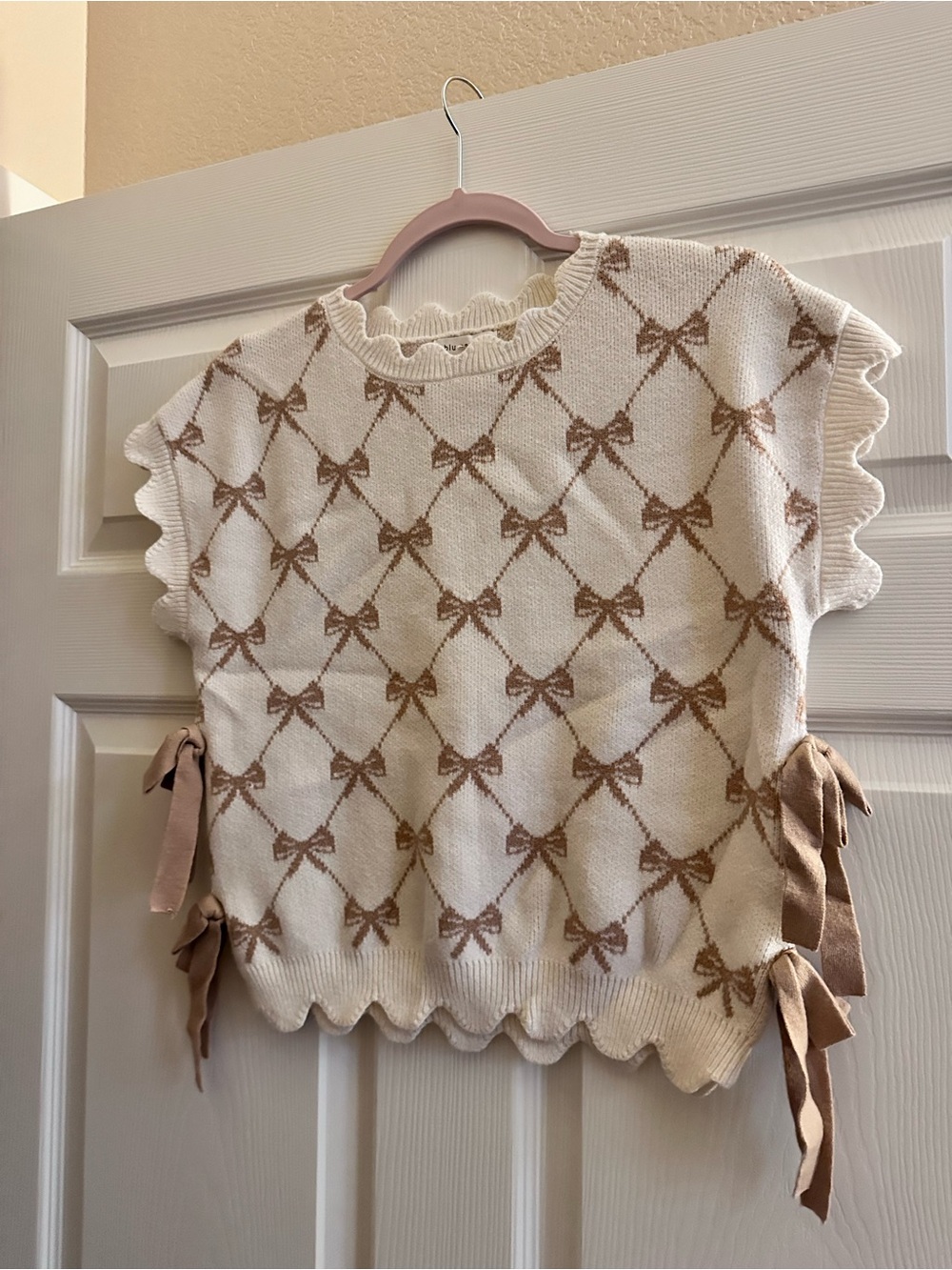 Blu Pepper Cream Knit Sweater with Tan Bow Pattern